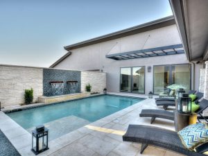 Pool with deckchairs