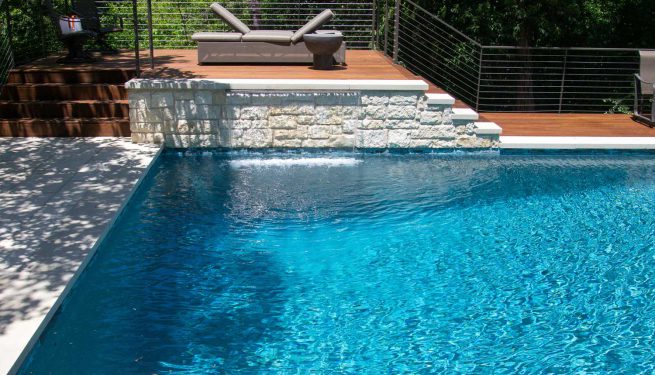 swimming pool with fountain and jets