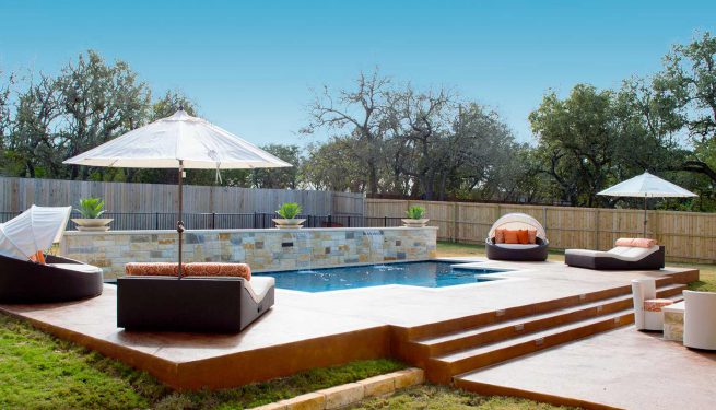 swimming pool in back yard